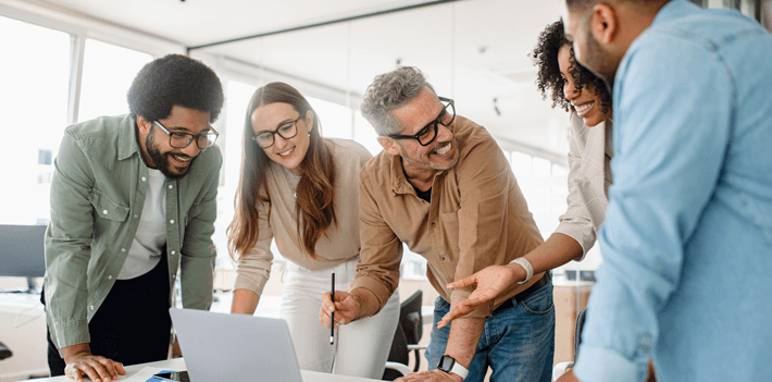Business professionals actively discussing ideas and strategies during a corporate meeting