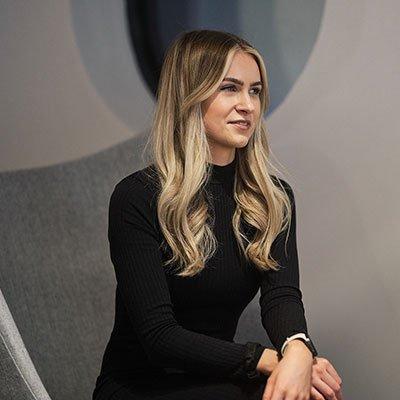 Amy Holloway smiling at the camera.