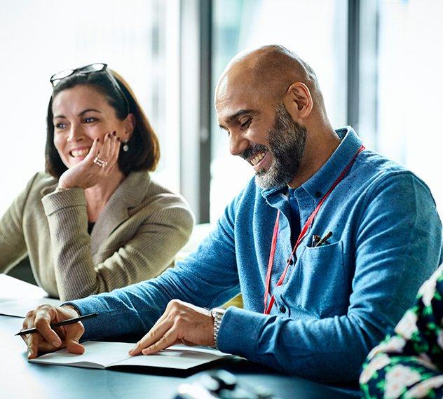 digital-leadership-showcase-two-people-smiling-slice