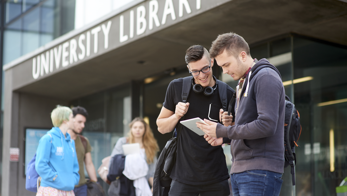 University of Lincoln students outside the building