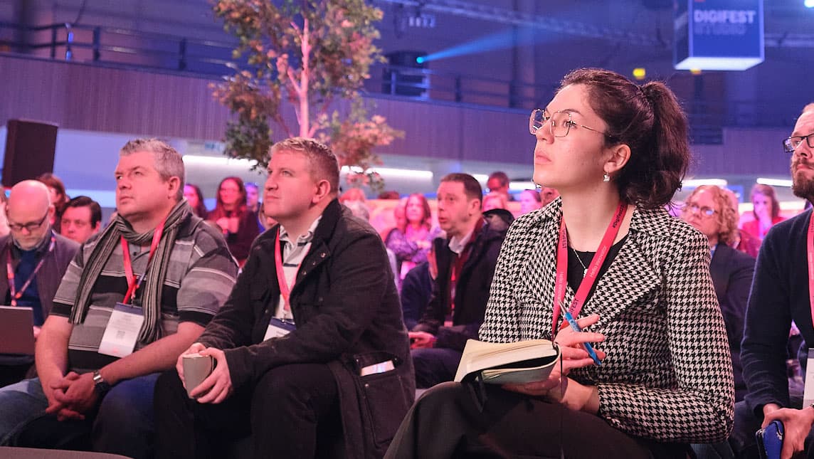 University colleagues listening during presentations at Digifest.