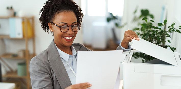 Woman using a printer
