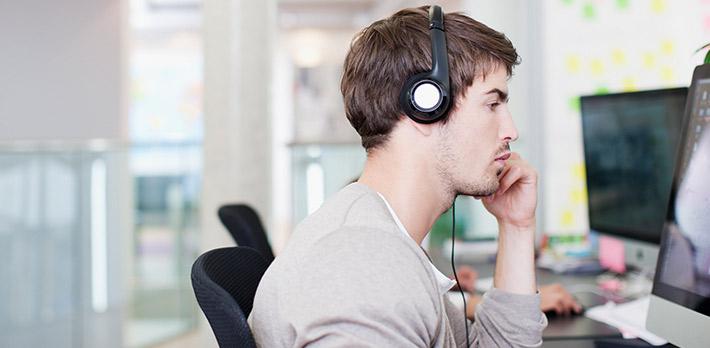 Man sat at computer working