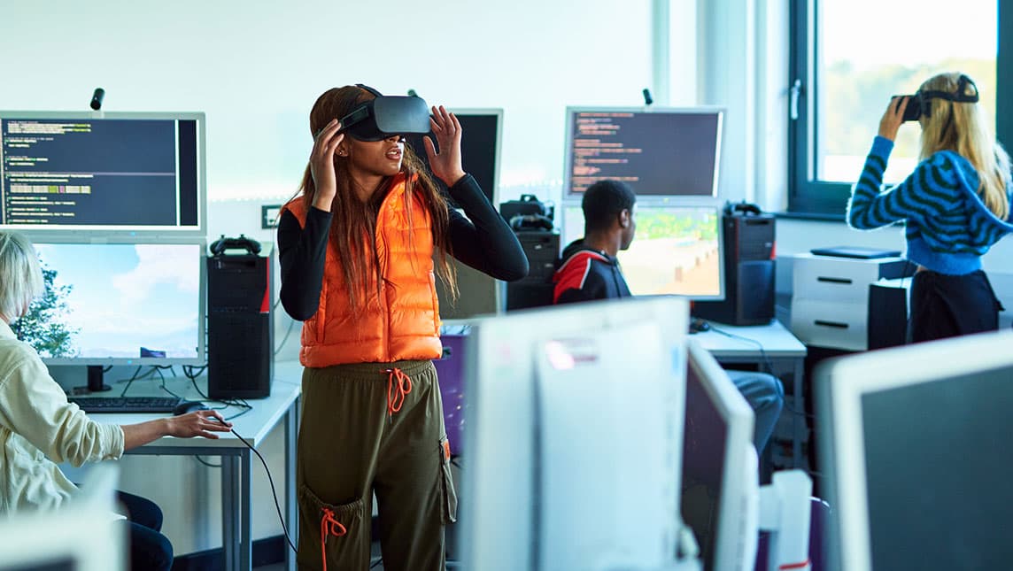 Students use virtual reality headsets.