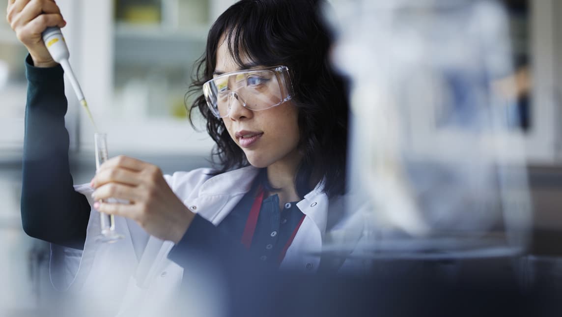 Young female scientist working in laboratory